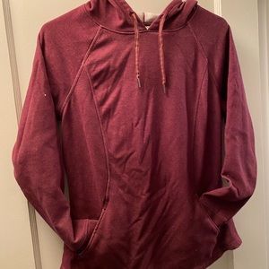 Purple/maroon athletic hoodie.